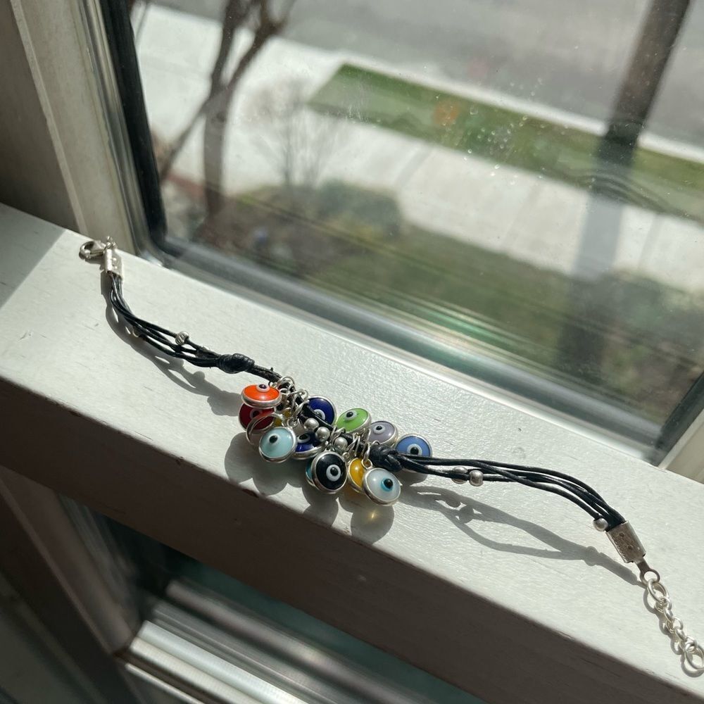 Beautiful pleather bracelet with colored evil eye pendants